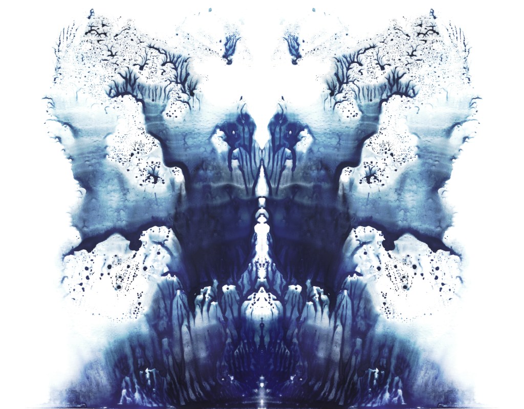 A blue inkblot image depicting what a typical Rorschach test would look like.